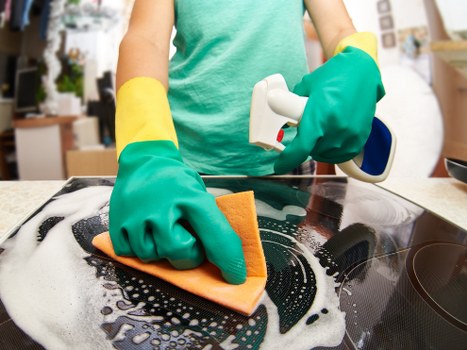 Sydenham house cleaner deep cleaning a kitchen area